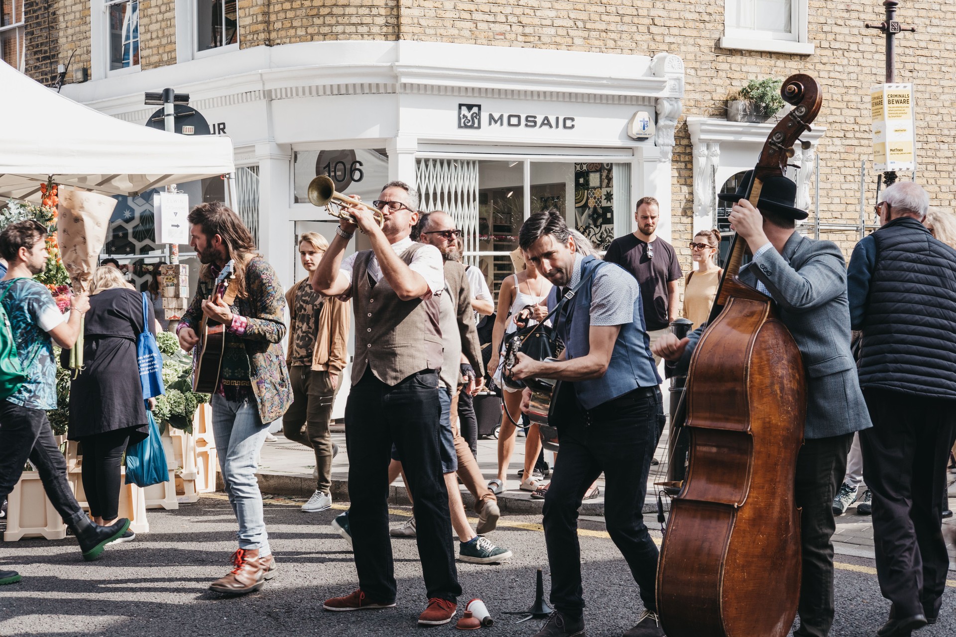 Band performing at the Columbia Road Flower Market, London, UK